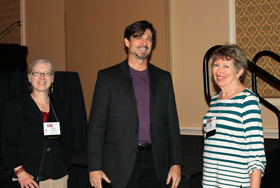 Phillip Metzger receives congratulations from Beth Cunningham, AAPT Executive Officer, and Mary Mogge, WM14 Program Chair.